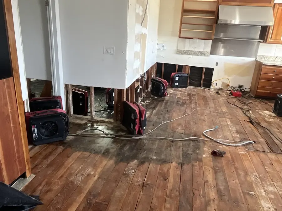 Water damaged hardwood floor being dried in Hawaiian Gardens