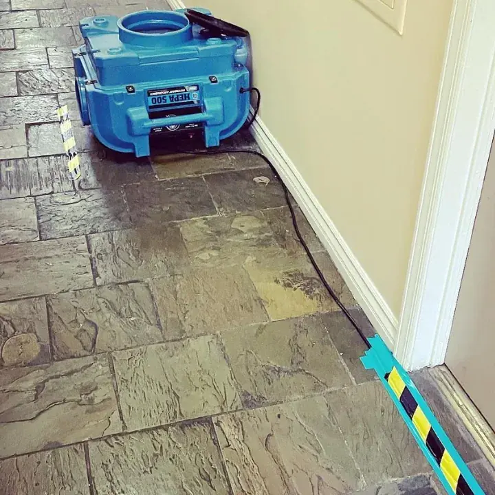 Drying equipment on a tile floor after a leak in Hawaiian Gardens